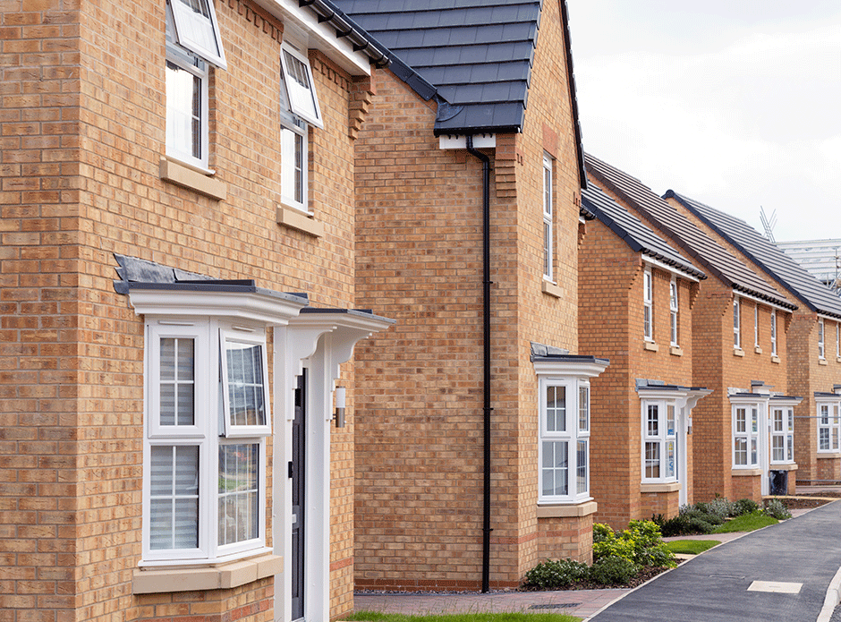 block of semi detached red bricked houses