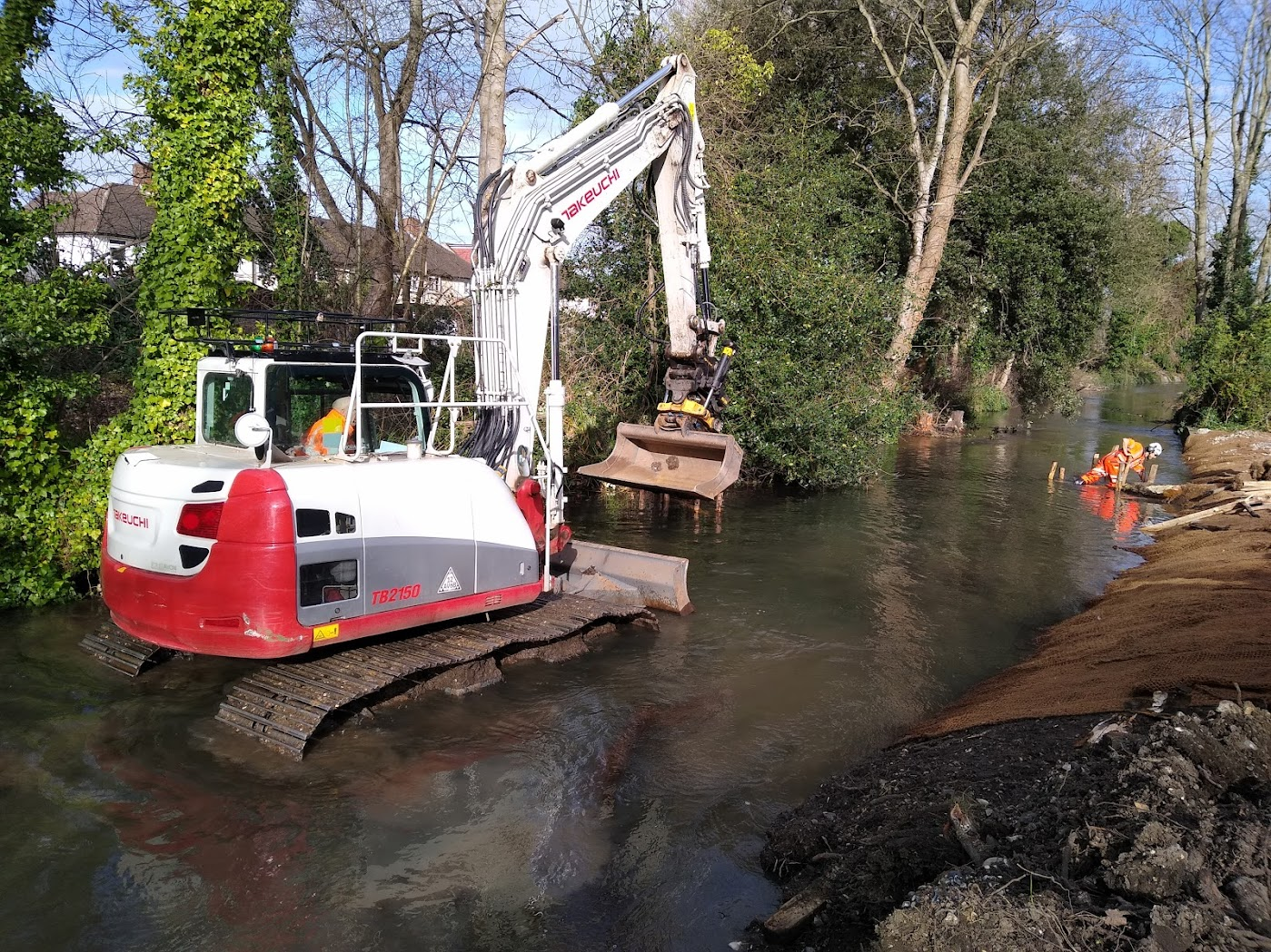 Photo of a digger in a pond
