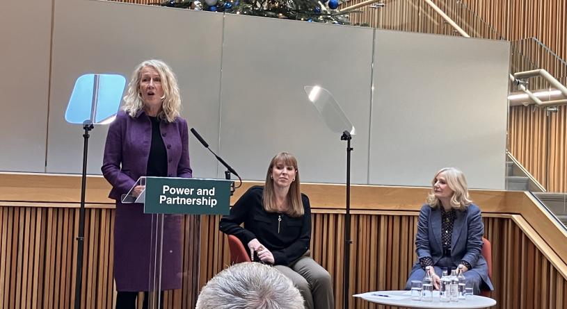 Louise Gittins on stage with Angela Rayner and Tracy Brabin