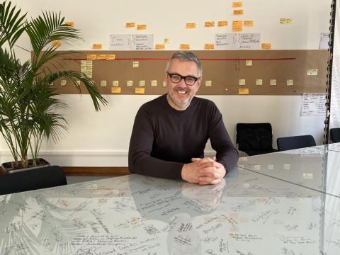RIBA President, Alan Jones sat in his London office