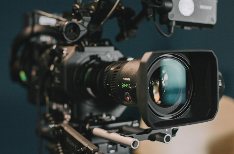 A video camera filming 