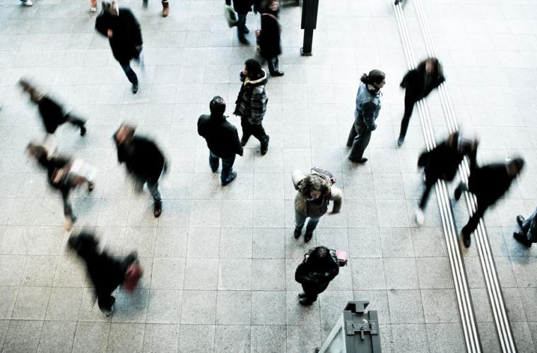 People walking past each other