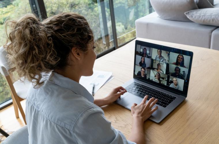 Remote working - lady having zoom meeting on a laptop