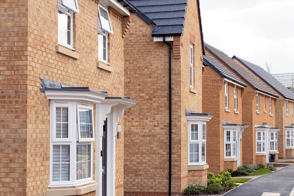 block of semi detached red bricked houses