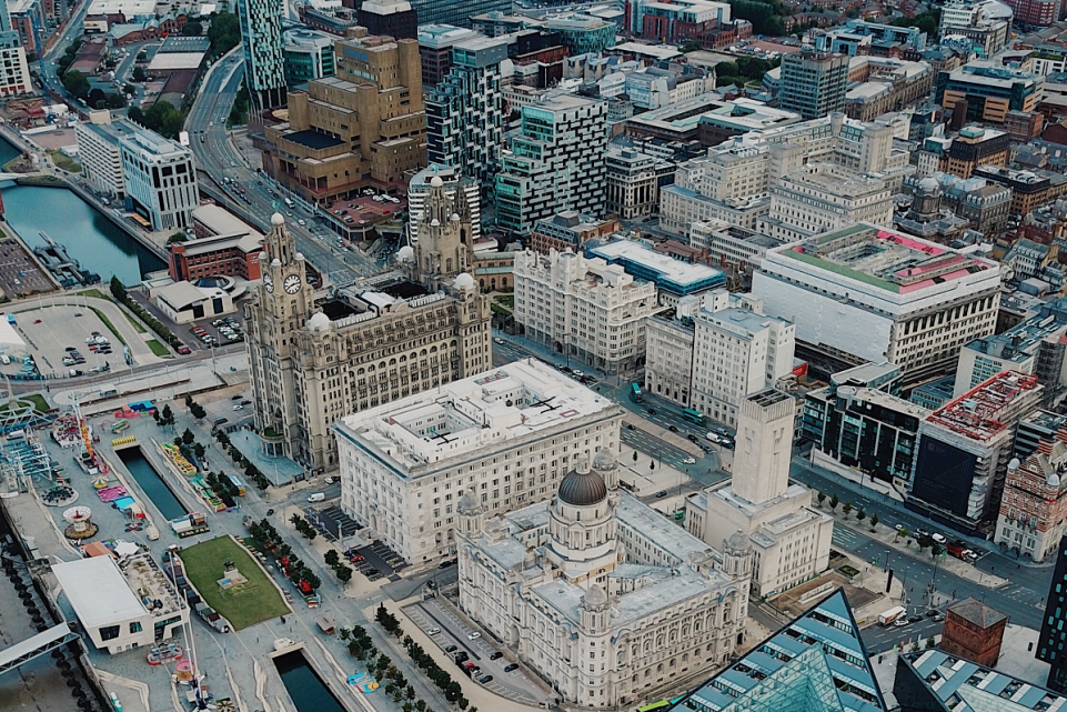 Ariel shot of Liverpool city centre and the water front including the liver buildings