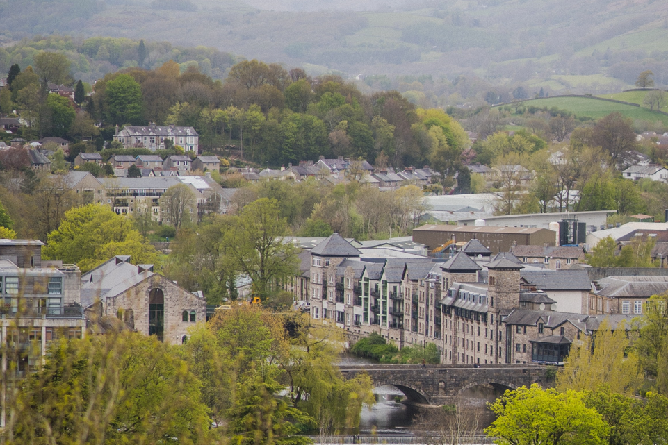 Rural town in the distance surrounded by hills